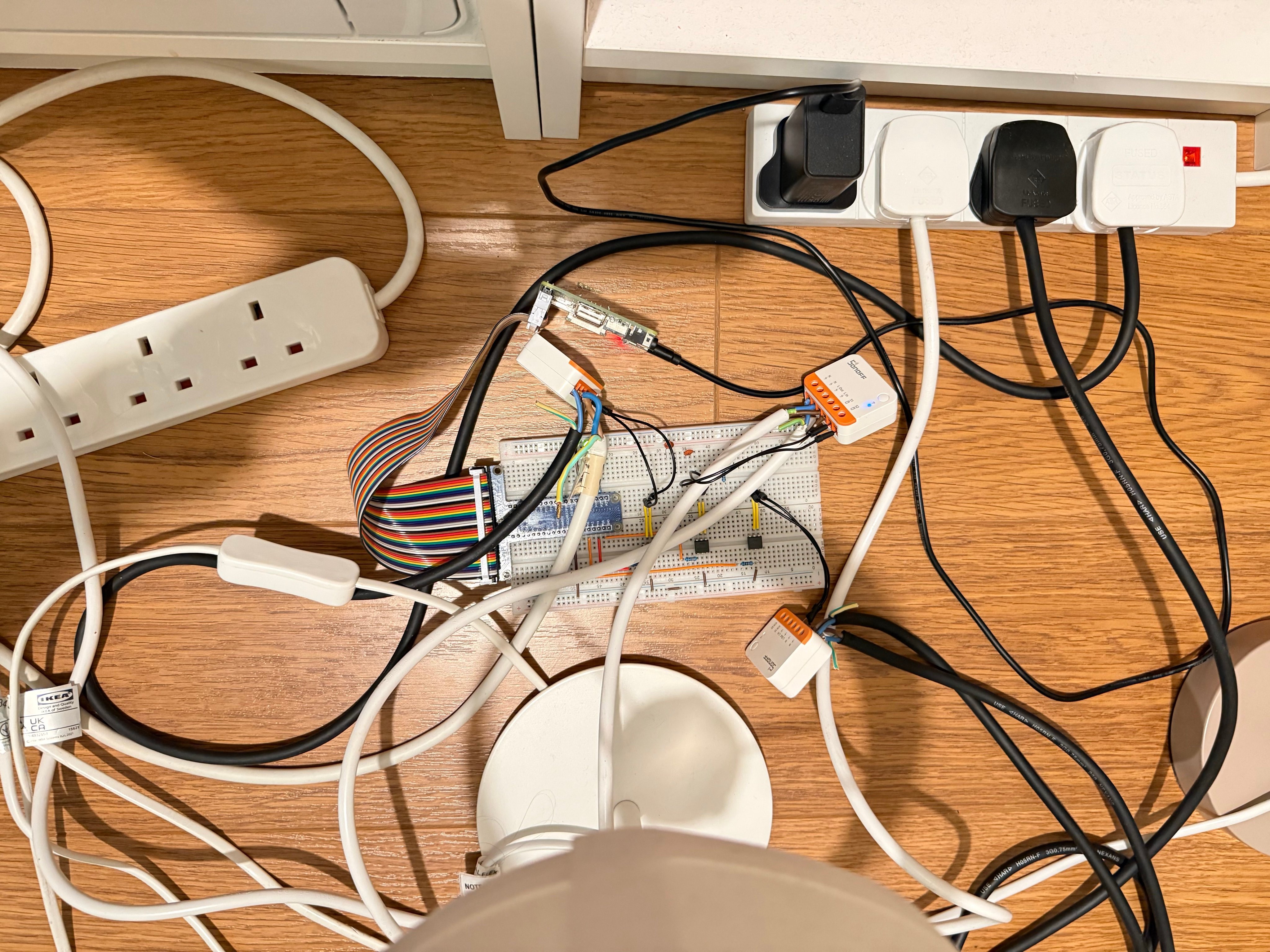 A mess of wires, relays, sockets and a breadboard